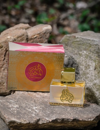 Parfum arabesc Al Dur Al Maknoon Gold pentru femei cu miros lemnos din gama Lattafa.